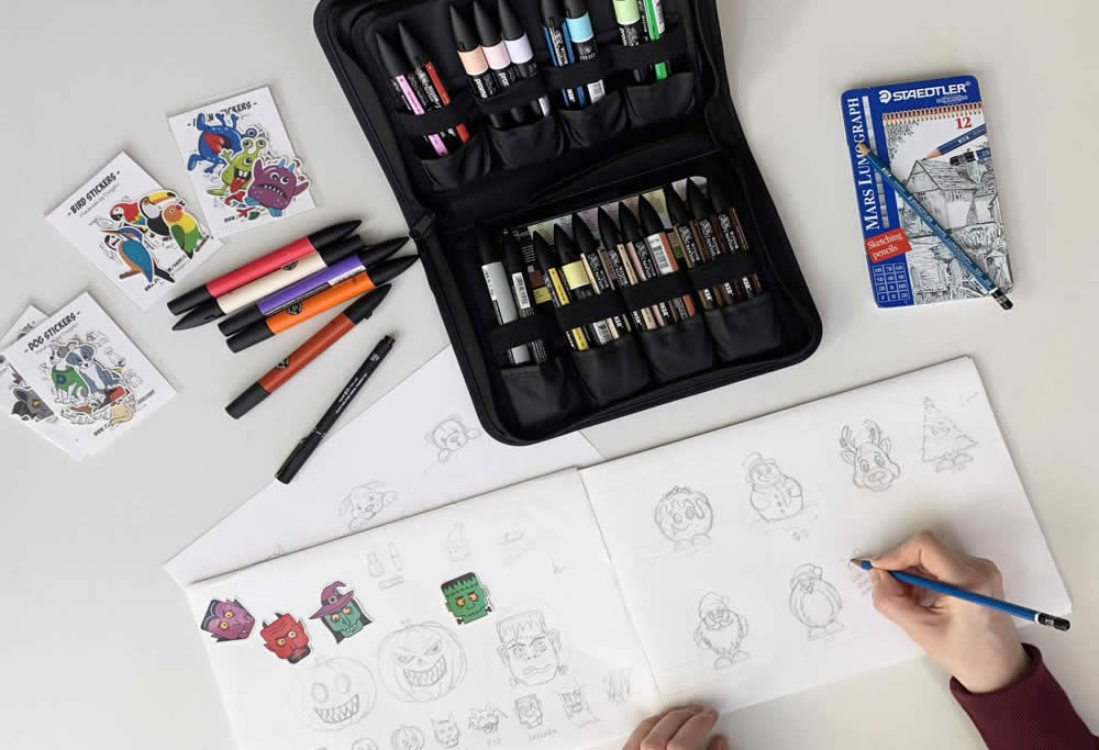 Sketching my sticker designs on paper